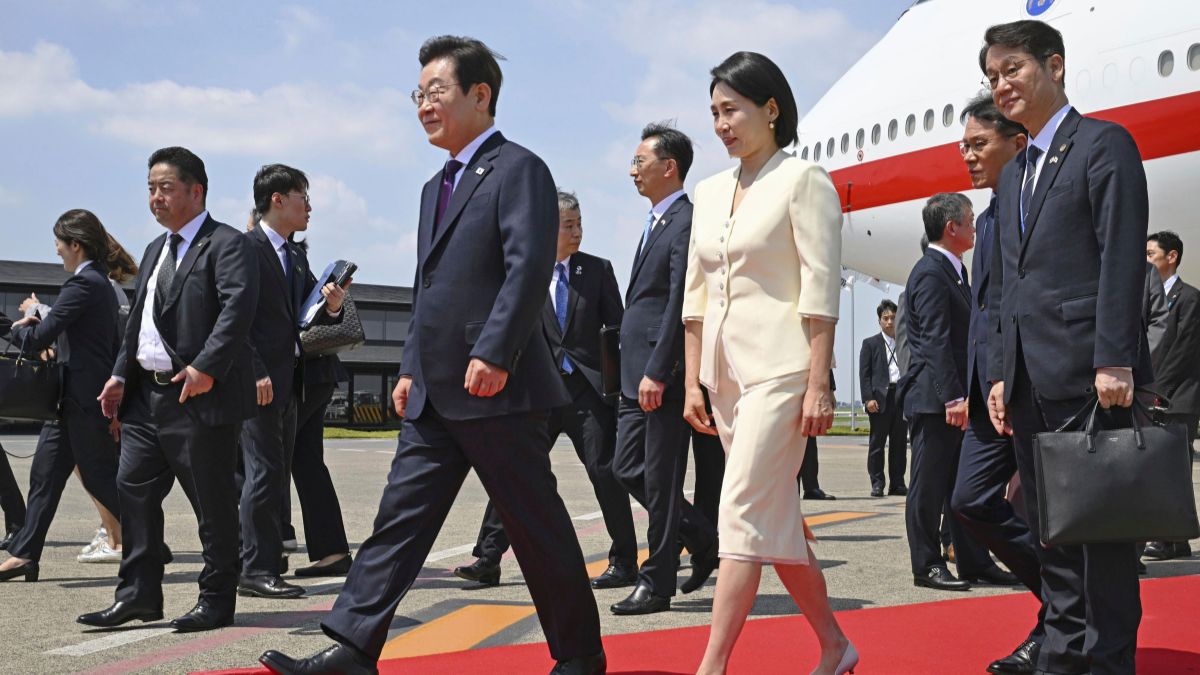 South Korean President Lee Jae Myung, center left, and his wife Kim Hea Kyung, center right, arrive at the Haneda airport in Tokyo, Japan, Saturday, Aug. 23, 2025. AP South Korean President Lee Jae Myung, center left, and his wife Kim Hea Kyung, center right, arrive at the Haneda airport in Tokyo, Japan, Saturday, Aug. 23, 2025. AP
