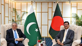 Foreign Affairs Advisor of Bangladesh's interim government Mohammad Touhid Hossain (R) with Pakistan's Foreign Minister Ishaq Dar during a bilateral meeting in Dhaka on August 24, 2025. Bangladesh's Ministry of Foreign Affairs/AFP
