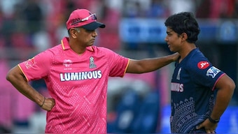 Rahul Dravid standing alongside young Vaibhav Suryavanshi. Image: AFP