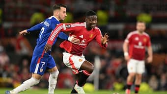 Manchester United's English midfielder Kobbie Mainoo fights for the ball. Image: AFP