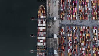 A drone view shows a ship and containers at the Port of Santos, in Santos, Brazil April 3, 2025. Reuters
