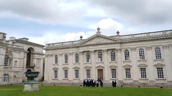 Graduating students take photos outside Senate House at Cambridge University, England, on May 17. 2024. AP File