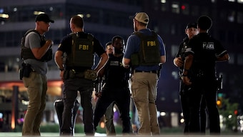 FBI agents and Secret Service Police officers patrol the Navy Yard neighbourhood, after US President Donald Trump's announcement to deploy the National Guard and federalise the Metropolitan Police Department in Washington, DC, US, August 12, 2025. File Image/Reuters