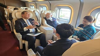 Prime Minister Narendra Modi and Japan's Shigeru Ishiba ride a bullet train together in Japan. Image Courtesy: @shigeruishiba/X