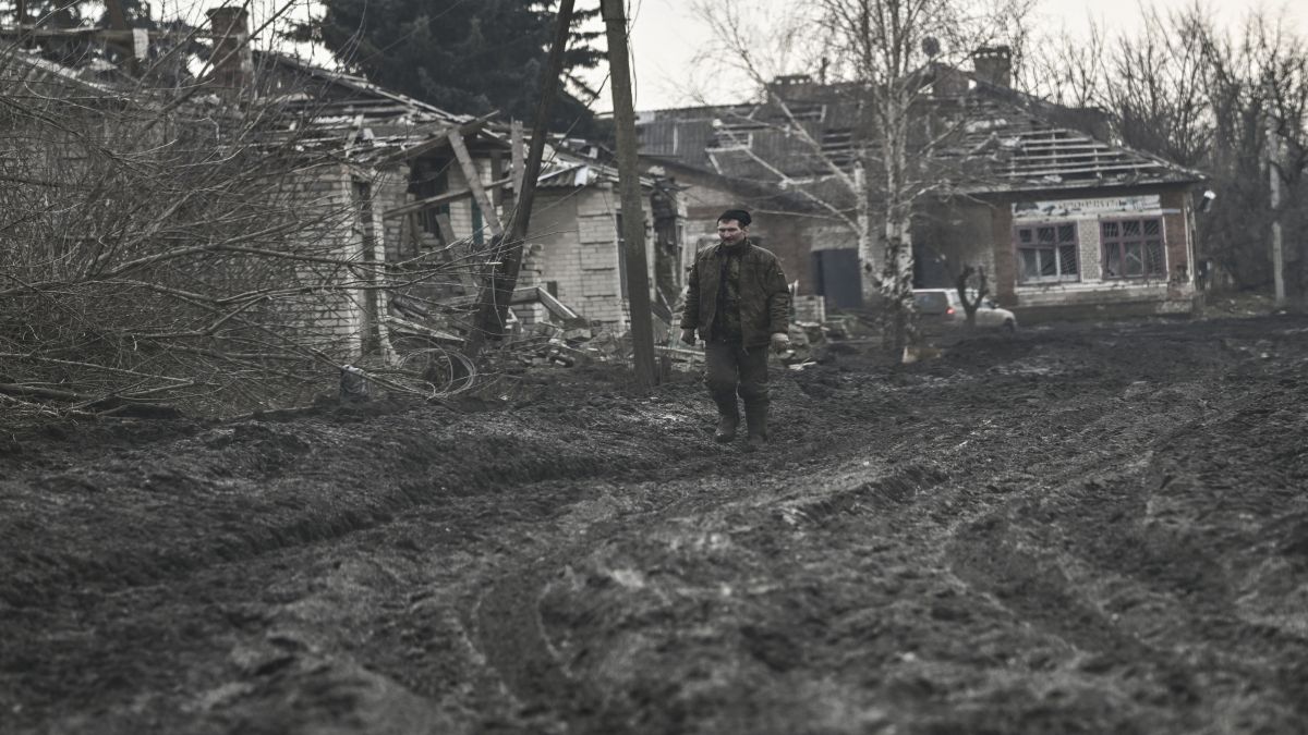 A man walks on a muddy road in the Donbas region. The future of Ukraine’s industrial heartland in the east of the country is uncertain, after Vladimir Putin reportedly demanded it be handed to Russia. File image/AFP A man walks on a muddy road in the Donbas region. The future of Ukraine’s industrial heartland in the east of the country is uncertain, after Vladimir Putin reportedly demanded it be handed to Russia. File image/AFP