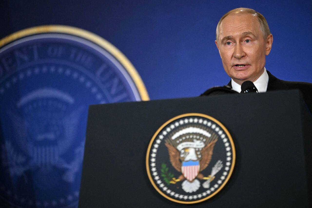 Russian President Vladimir Putin speaks during a joint press conference with US President Donald Trump.  AFP