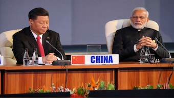 Indian Prime Minister Narendra Modi and China's President Xi Jinping. Many experts note that China and India are striking the same defiant note against Trump. File image/Reuters