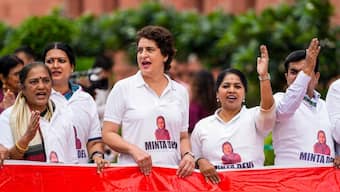 Opposition MPs caught plenty of attention as they staged a protest with matching white T-shirts printed with the face of a woman named 'Minta Devi'. PTI