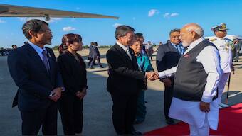 Prime Minister Narendra Modi bids adieu to Japan as he emplanes for China where he will attend the SCO meet. Image Courtesy: @MEAIndia/X