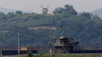 A North Korean soldier stands guard at his guard post inside North Korean territory. Satellite imagery reveals that Pyongyang is operating a huge missile base known as Sinpung-dong and it is believed to house ICBMs. File image/Reuters