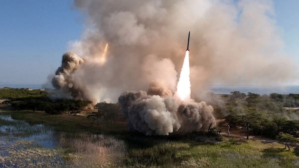 North Korea test-fires 'new' air defence missiles, says state media amid tensions after firing at border