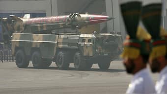Pakistan's nuclear-capable missile, Shaheen 1, is driven in Islamabad. The country boasts of several nuclear weapons and spends billions to develop them. File image/Reuters