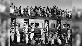Refugees crowd onto a train as they try to flee India near New Delhi in September 1947. Some 15 million people crossed new borders during the violent partition of British-ruled India. At times, mobs targeted and killed passengers travelling in either direction; the trains carrying their corpses became known as "ghost trains." File Image/AP