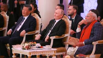 Chinese President Xi Jinping, Russian President Vladimir Putin and Prime Minister Narendra Modi attend a concert before an informal dinner on the sidelines of the Brics Summit in Kazan, Russia October 22, 2024. The 2025 SCO summit will bring together the three leaders for the first time since Donald Trump imposed hefty sanctions on India. File image/Reuters
