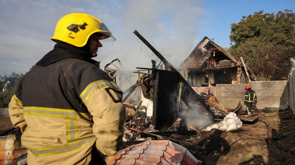 Firefighters work at the site of a Russian missile strike, amid Russia's attack on Ukraine, in the village of Sknyliv on the outskirts of Lviv, Ukraine. Reuters Firefighters work at the site of a Russian missile strike, amid Russia's attack on Ukraine, in the village of Sknyliv on the outskirts of Lviv, Ukraine. Reuters