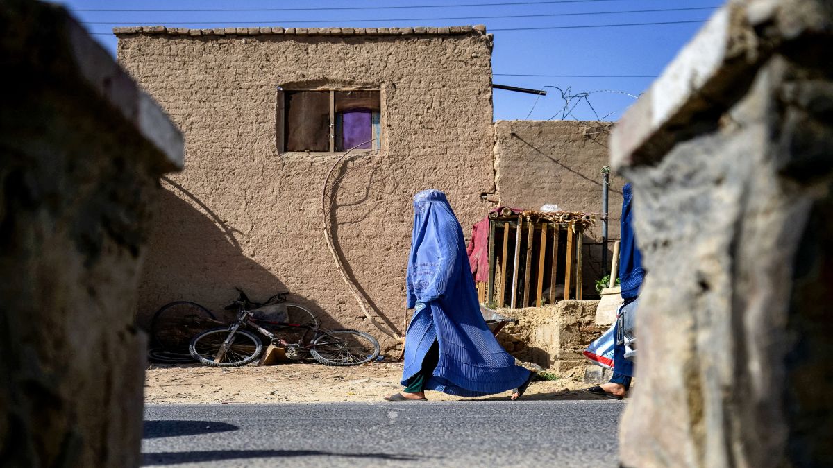 An Afghan burqa-clad woman walks along a street in Kandahar. File image/AFP An Afghan burqa-clad woman walks along a street in Kandahar. File image/AFP