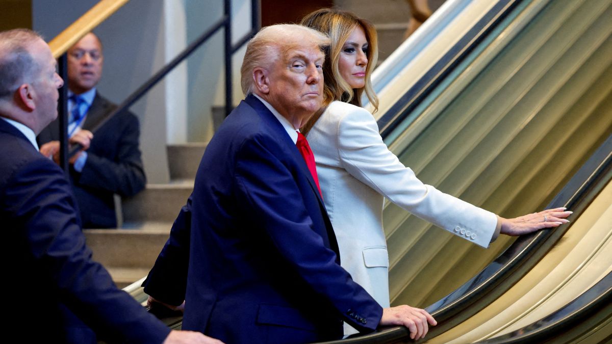 As Trump made his way to deliver his address, the escalator he had just stepped on suddenly stopped. Reuters
As Trump made his way to deliver his address, the escalator he had just stepped on suddenly stopped. Reuters