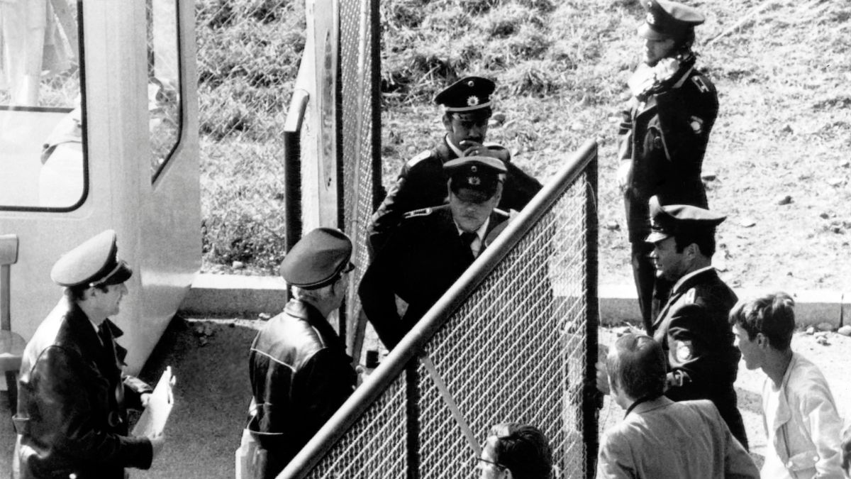 Policemen barricade the entrance of the Olympic village. AFP/File Photo
Policemen barricade the entrance of the Olympic village. AFP/File Photo