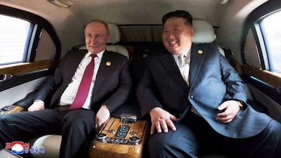 Russian President Vladimir Putin and North Korean leader Kim Jong Un sit in a vehicle during their visit to Beijing. KCNA/Reuters
