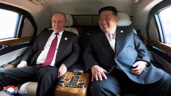 Russian President Vladimir Putin and North Korean leader Kim Jong Un sit in a vehicle during their visit to Beijing. KCNA/Reuters
