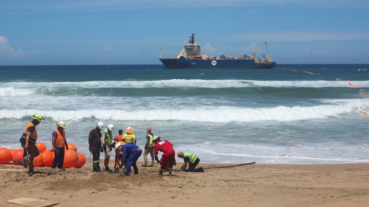 (File) Workers install an undersea cable. Reuters (File) Workers install an undersea cable. Reuters