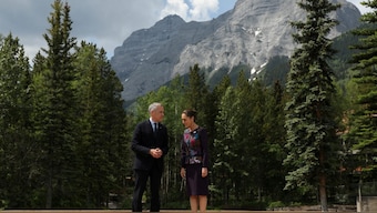 (File) Canadian Prime Minister Mark Carney and Mexico's President Claudia Sheinbaum stand together on the stage ahead of a family photo during the G7 Leaders' Summit in Kananaskis, in Alberta, Canada, on June 17, 2025. Reuters