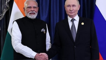 Russian President Vladimir Putin and Indian Prime Minister Narendra Modi shake hands during a meeting on the sidelines of the Shanghai Cooperation Organisation (SCO) summit in Tianjin, China. Reuters