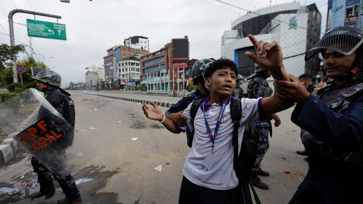 Riot police personnel try to detain a demonstrator during a protest against corruption and the government’s decision to block several social media platforms, in Kathmandu, Nepal. Reuters Riot police personnel try to detain a demonstrator during a protest against corruption and the government’s decision to block several social media platforms, in Kathmandu, Nepal. Reuters