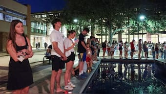 Attendees pray at a Texas A&amp;M University vigil for US right-wing activist and commentator Charlie Kirk in College Station, Texas, US on September 11, 2025. Reuters