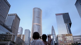 Why China plans to 'serve' and not build more to save its economy