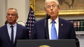US. President Donald Trump, next to US Secretary of Health and Human Services Robert F Kennedy Jr., delivers remarks linking autism to childhood vaccines and to the use of popular pain medication. Reuters