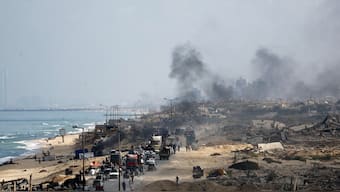 Displaced Palestinians, fleeing northern Gaza due to an Israeli military operation, move southward along a destroyed area after Israeli forces ordered residents of Gaza City to evacuate to the south, in the central Gaza Strip, September 23, 2025. Reuters