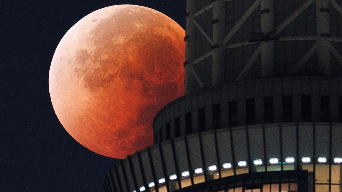 The Moon as seen from behind the Tokyo Skytree in Japan on September 8, 2025. AFP
The Moon as seen from behind the Tokyo Skytree in Japan on September 8, 2025. AFP
