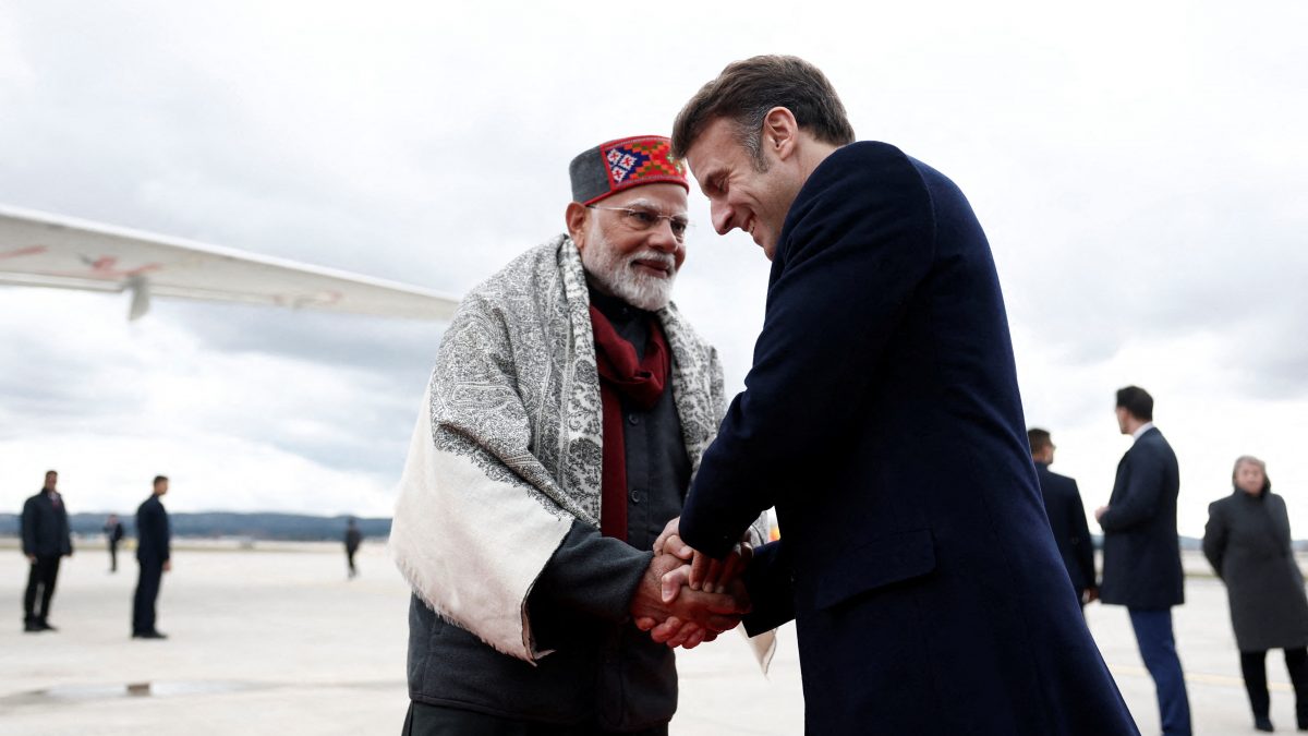 French President Emmanuel Macron (R) shakes hands with Indian Prime Minister Narendra Modi after a departure ceremony at Marseille Provence airport in Marignane as part of a visit in Marseille, France, February 12, 2025. (Photo by Christian Hartmann / POOL / AFP) French President Emmanuel Macron (R) shakes hands with Indian Prime Minister Narendra Modi after a departure ceremony at Marseille Provence airport in Marignane as part of a visit in Marseille, France, February 12, 2025. (Photo by Christian Hartmann / POOL / AFP)