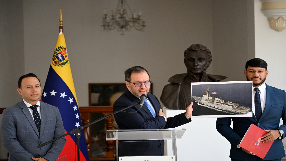 Venezuela's Foreign Minister Yvan Gil shows a picture of a boat bearing a US flag during a press conference at the Ministry of Foreign Affairs in Caracas on September 13, 2025. AP Venezuela's Foreign Minister Yvan Gil shows a picture of a boat bearing a US flag during a press conference at the Ministry of Foreign Affairs in Caracas on September 13, 2025. AP