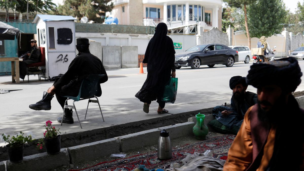 An Afghan woman walks among Taliban soldiers at a checkpoint in Kabul, Afghanistan, July 6, 2023. File Image/Reuter An Afghan woman walks among Taliban soldiers at a checkpoint in Kabul, Afghanistan, July 6, 2023. File Image/Reuter