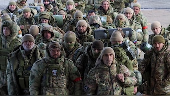 Volunteers, who joined the Russian armed forces and took military training in Chechnya, board a plane before departing for positions of the Akhmat battalion involved in Russia's military campaign in Ukraine, at an airport in Grozny, Russia, January 17, 2024. File Image/Reuters