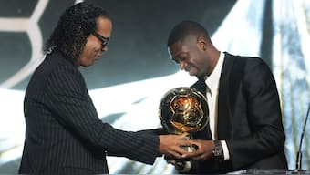 Ballon d'Or 2025 winner Ousmane Dembele receives the trophy from Ronaldinho. Image: AP
