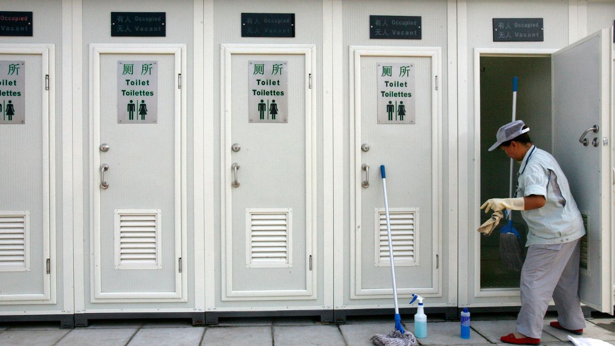A worker cleans a newly installed public toilet at the Olympic Green in Beijing, China, July 21, 2008. Representational Image/Reuters A worker cleans a newly installed public toilet at the Olympic Green in Beijing, China, July 21, 2008. Representational Image/Reuters