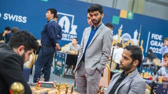 Indian Grandmaster D Gukesh watches compatriot Arjun Erigaisi in action. Image: FIDE