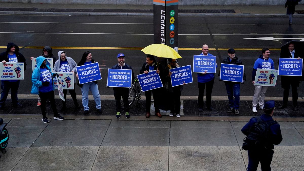 Labour union members hold placards on the day of a rally in support of federal workers during a rush hour protest outside the L'Enfant Plaza Metro Station in Washington, DC, US, March 24, 2025. File Image/Reuters Labour union members hold placards on the day of a rally in support of federal workers during a rush hour protest outside the L'Enfant Plaza Metro Station in Washington, DC, US, March 24, 2025. File Image/Reuters