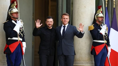 French President Emmanuel Macron and Ukraine's President Volodymyr Zelenskiy wave as they meet at the Elysee Palace, in Paris, France, September 3, 2025. (Photo: Sarah Meyssonnier/Reuters)