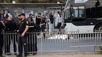 Israeli police secure the scene where a suspected shooting attack took place at the outskirts of Jerusalem, September 8, 2025 (Ammar Awad/Reuters)