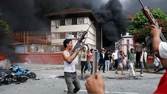Demonstrators carrying weapons, taken from the Supreme Court, take part in a protest against the government in Kathmandu, Nepal, on September 9, 2025. (Photo: Bikram Rai/Reuters)