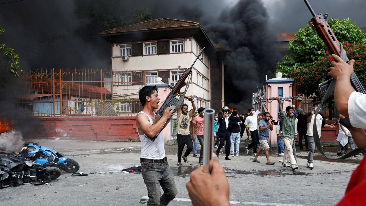 Demonstrators carrying weapons, taken from the Supreme Court, take part in a protest against the government in Kathmandu, Nepal, on September 9, 2025. (Photo: Bikram Rai/Reuters) Demonstrators carrying weapons, taken from the Supreme Court, take part in a protest against the government in Kathmandu, Nepal, on September 9, 2025. (Photo: Bikram Rai/Reuters)