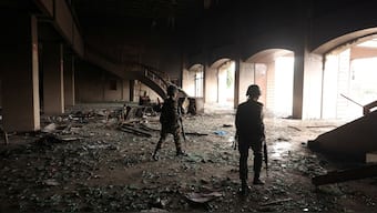 Nepali Army soldiers walk inside the Parliament house that was set on fire by protesters in Kathmandu, Nepal, on September 10, 2025. (Photo: Adnan Abidi/Reutes)