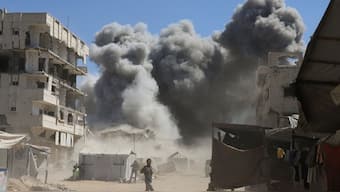 Smoke rises from an evacuated residential building which was housing displaced Palestinians, after it was hit by an Israeli air strike, in Gaza City, on September 14, 2025. (Photo: Ebrahim Hajjaj/Reuters)