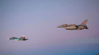 A Russian Su-34 Fullback strike aircraft (front) is seen escorted by a Norwegian Air Force jet in October 31, 2014. (Photo: Reuters)