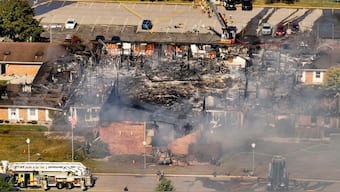 Emergency crews respond to a shooting and fire at The Church of Jesus Christ of Latter-day Saints, in Grand Blanc Township, Michigan, on September 28, 2025. (Photo: David Guralnick/Detroit News via AP)