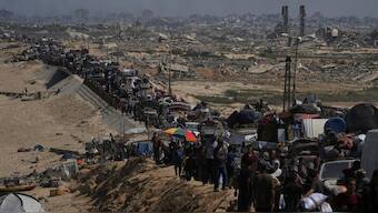 Displaced Palestinians flee northern Gaza along the coastal road toward the south, after Israel's military says its expanded operation in Gaza City has begun and warns residents to leave, September 16, 2025. File Image/AP